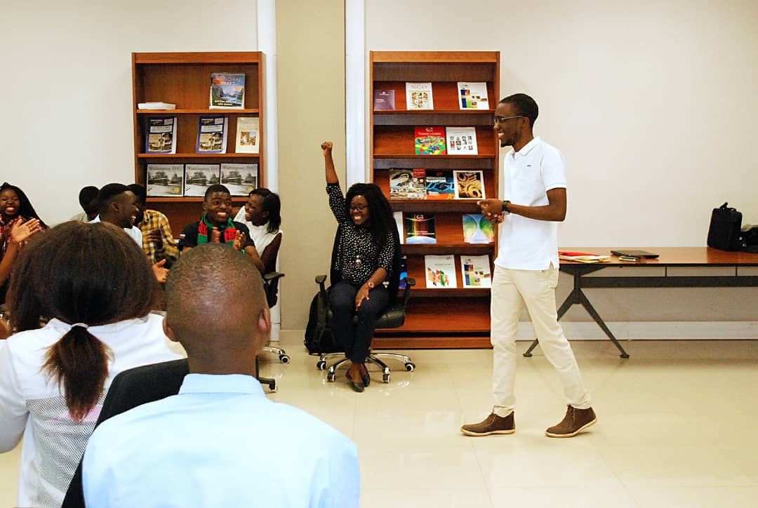 Shuko Musemangezhi presenting to a seated group in a workshop room
